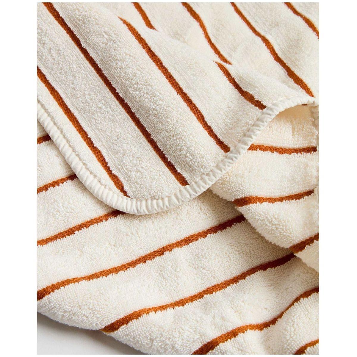 Handtuch Dorane aus 100 % Baumwolle mit orangefarbenen Streifen 70 x 140 cm